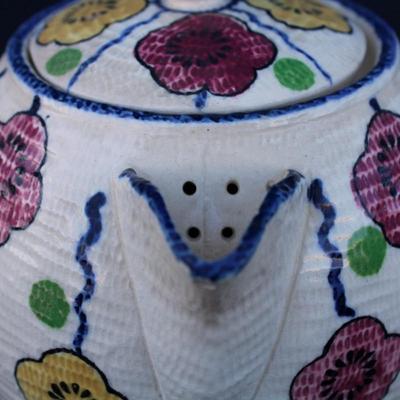 Revelation (Japan) teapot, rolled newspaper basket and decor including four oversized paper clips, ceramic pen holder and a handcrafted...
