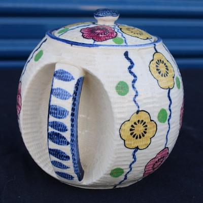 Revelation (Japan) teapot, rolled newspaper basket and decor including four oversized paper clips, ceramic pen holder and a handcrafted...
