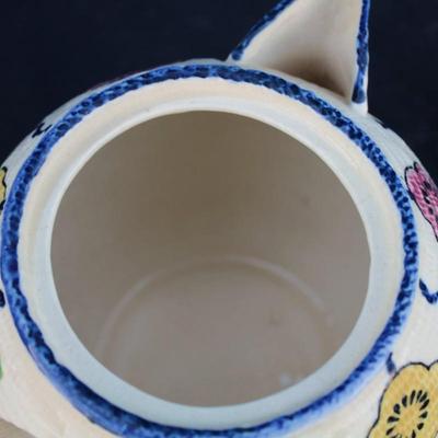 Revelation (Japan) teapot, rolled newspaper basket and decor including four oversized paper clips, ceramic pen holder and a handcrafted...