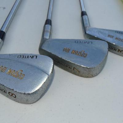Set of Northwestern Gold Clubs plus bag. Various conditions