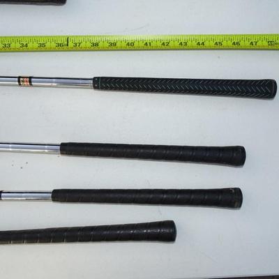 Set of Northwestern Gold Clubs plus bag. Various conditions