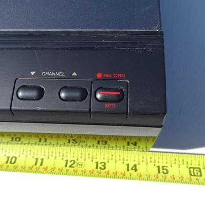 RCA VHS player, Quasar VHQ-940 VHS Player, and a Philips DVD Player