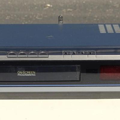 RCA VHS player, Quasar VHQ-940 VHS Player, and a Philips DVD Player