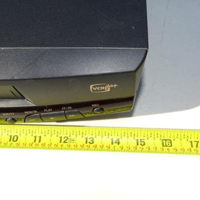 RCA VHS player, Quasar VHQ-940 VHS Player, and a Philips DVD Player