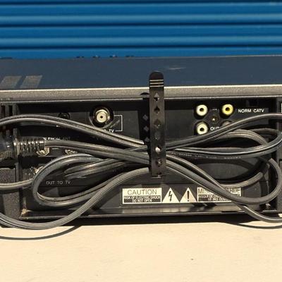 RCA VHS player, Quasar VHQ-940 VHS Player, and a Philips DVD Player