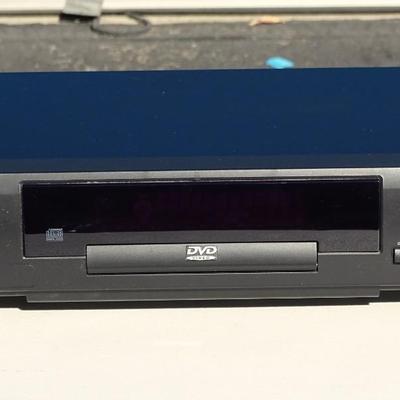 RCA VHS player, Quasar VHQ-940 VHS Player, and a Philips DVD Player