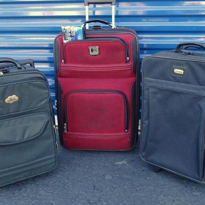Assortment of luggage including Skyway, Travelpro and Kenneth Cole.