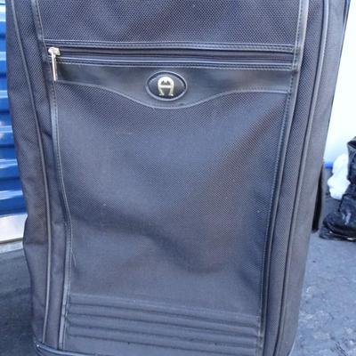 Assortment of luggage including Ventura, Travelpro and Ettenne Aigner