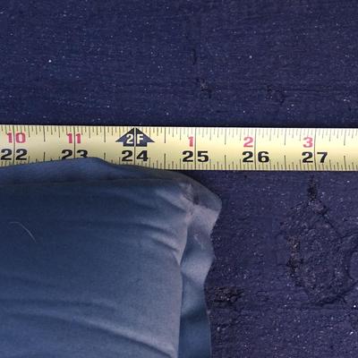 REI Inflatable camping sleeping pad.