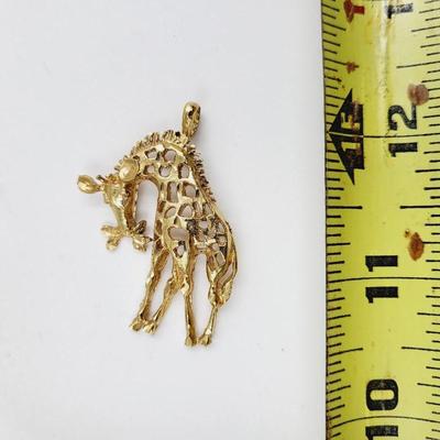 CUTE GOLD TONED GIRAFFE PENDANT