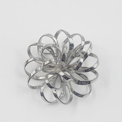 VINTAGE SPIRAL FLOWER SILVER TONED PIN