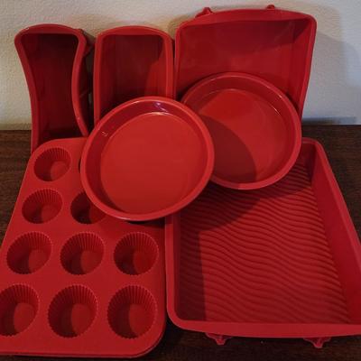 Lot of 7 Red Silicone Bakeware pans - bread pans, muffin tray, cake pans. New - Never used.