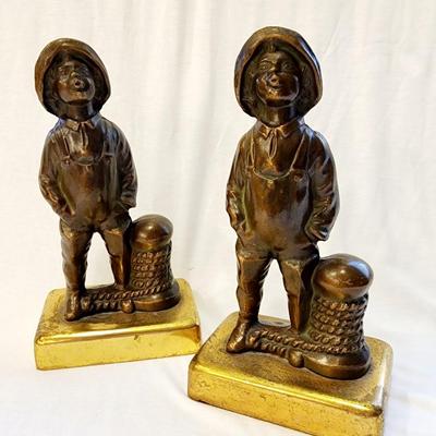 Brass Nautical Bookends - Boy in waders standing near mooring rope