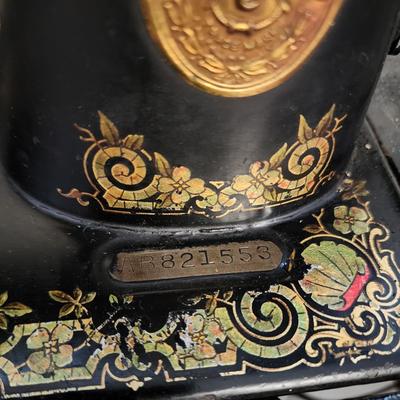 Beautiful gold gilt early electric Singer sewing machine in cabinet