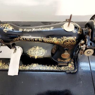 Beautiful gold gilt early electric Singer sewing machine in cabinet