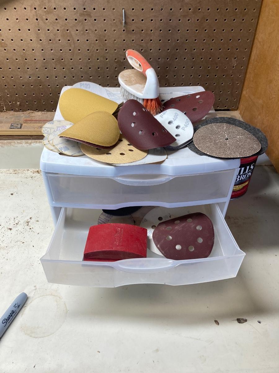 SANDPAPER, STORAGE CONTAINER, AND SCRUB BRUSH