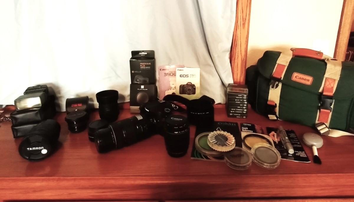 CANON CAMERA WITH LENSES, CARRY BAG AND LOTS OF EXTRAS