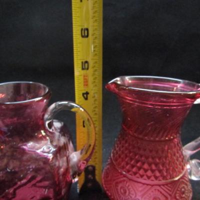 Pair of Cranberry Glass Pitchers (#98)