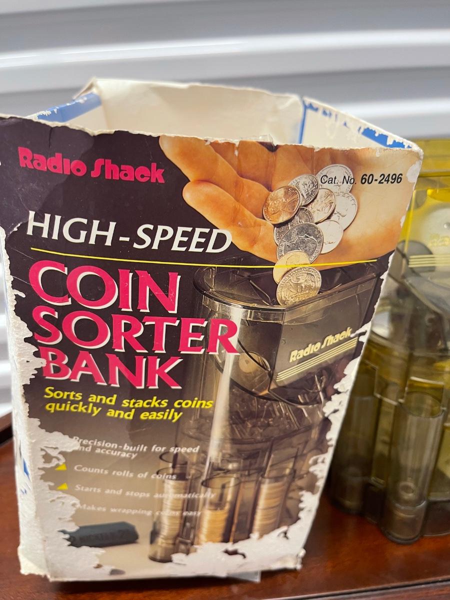 Vintage Radio Shack coin sorter bank in original box. 9” tall