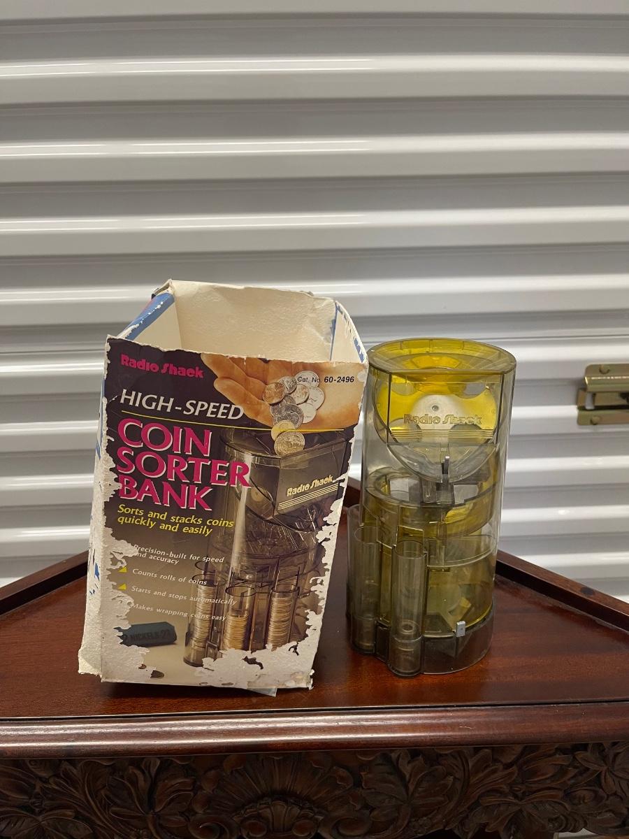 Vintage Radio Shack coin sorter bank in original box. 9” tall