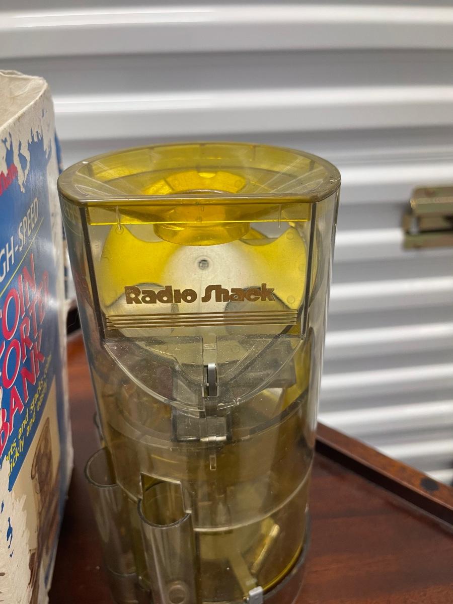 Vintage Radio Shack coin sorter bank in original box. 9” tall