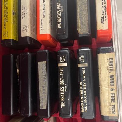 A case of 8 track tapes. Case is 17”x8”