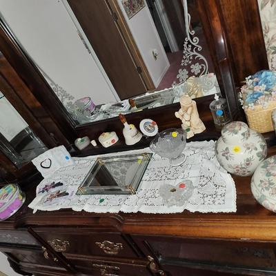 Vintage dresser with lighted curio and more