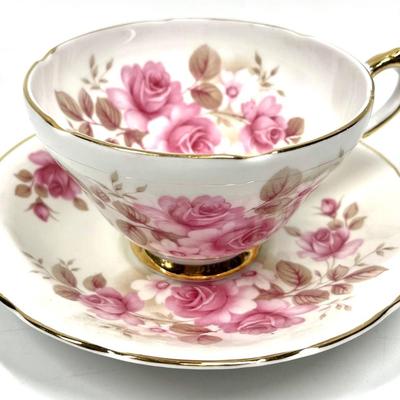 Rose patterned tea cup with saucer Royal Sutherland Staffordshire