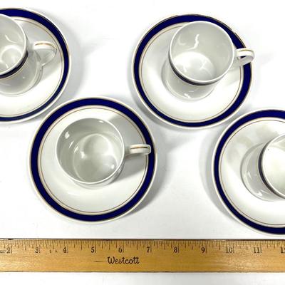 Crown Porcelain Thailand Set of four white and navy blue patterned miniature coffee cups and saucers