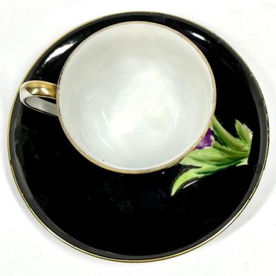 Made in Occupied Japan black and purple flower tea cup and saucer
