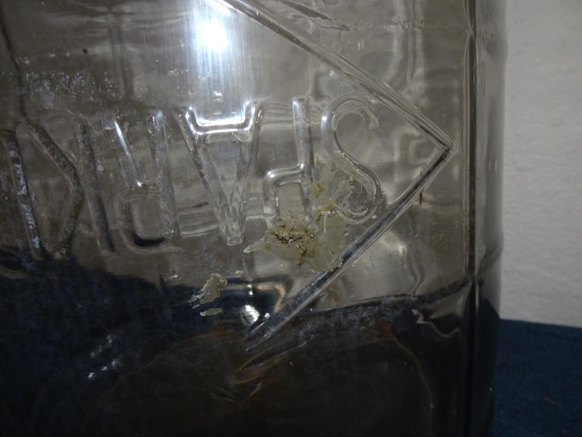 LOT 15. VINTAGE GLASS SPARKLETTS 5 GALLON BOTTLE