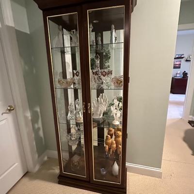 Wood and glass curio cabinet