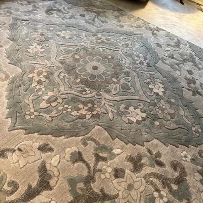 Beautiful floor rug in greys and blues
