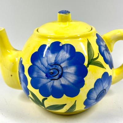 Yellow and blue flower patterned tea pot