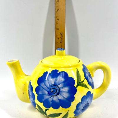 Yellow and blue flower patterned tea pot