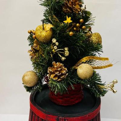 Christmas Tree in Wicker Basket and Red Basket