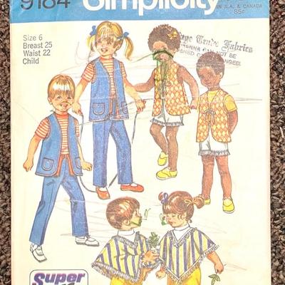 Simplicity Fashion Magazine Pattern No. 9184 Toddlers’ and Child’s Super-Jiffy pants in two lengths, vest and poncho size 6 breast 25...