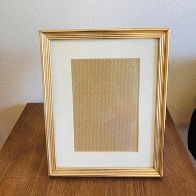 Picture Frames and Three Photo Books    (CR - RH)