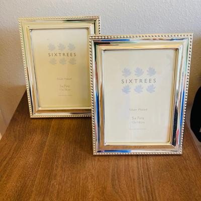 Picture Frames and Three Photo Books    (CR - RH)