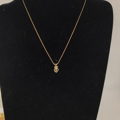 14 KT. Pendant and Chain Marked