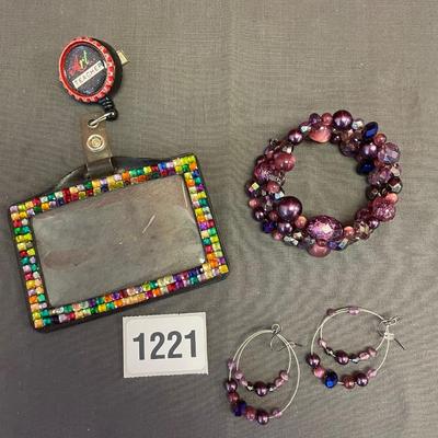 Bracelet, earrings and nurse badge