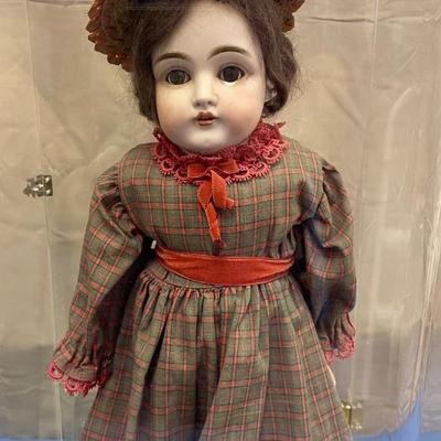 Doll in display Cabinet