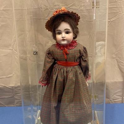 Doll in display Cabinet