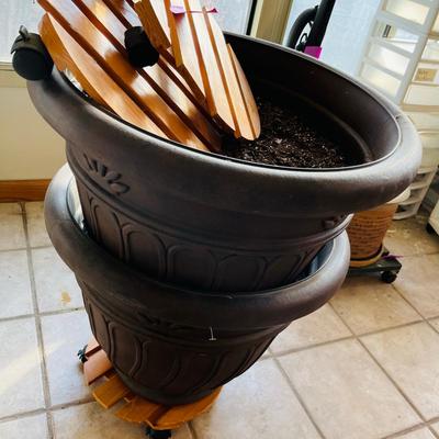 2 Large flower pots w/ 3 rolling stands