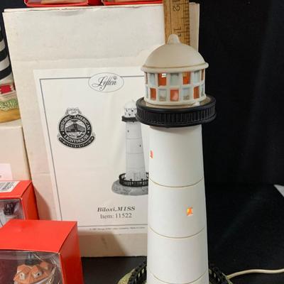 LOT 39R: Lefton Light House Collection: Ornaments, Music Box, Ornaments and  & Light up Lighthouse