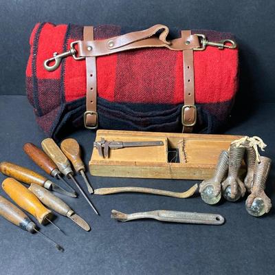 LOT 56: Leather Strap Blanket, Tools and Clawfoot Feet