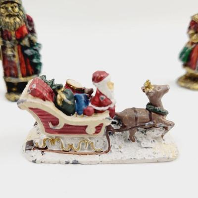 HEAVY CAST IRON SANTAS & SLEIGH CHRISTMAS COLLECTABLES