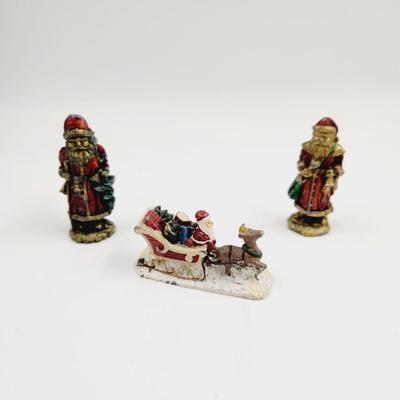 HEAVY CAST IRON SANTAS & SLEIGH CHRISTMAS COLLECTABLES