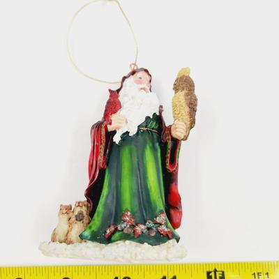 FATHER CHRISTMAS W/ AN OWL ORNAMENT