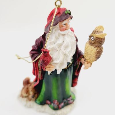 FATHER CHRISTMAS W/ AN OWL ORNAMENT